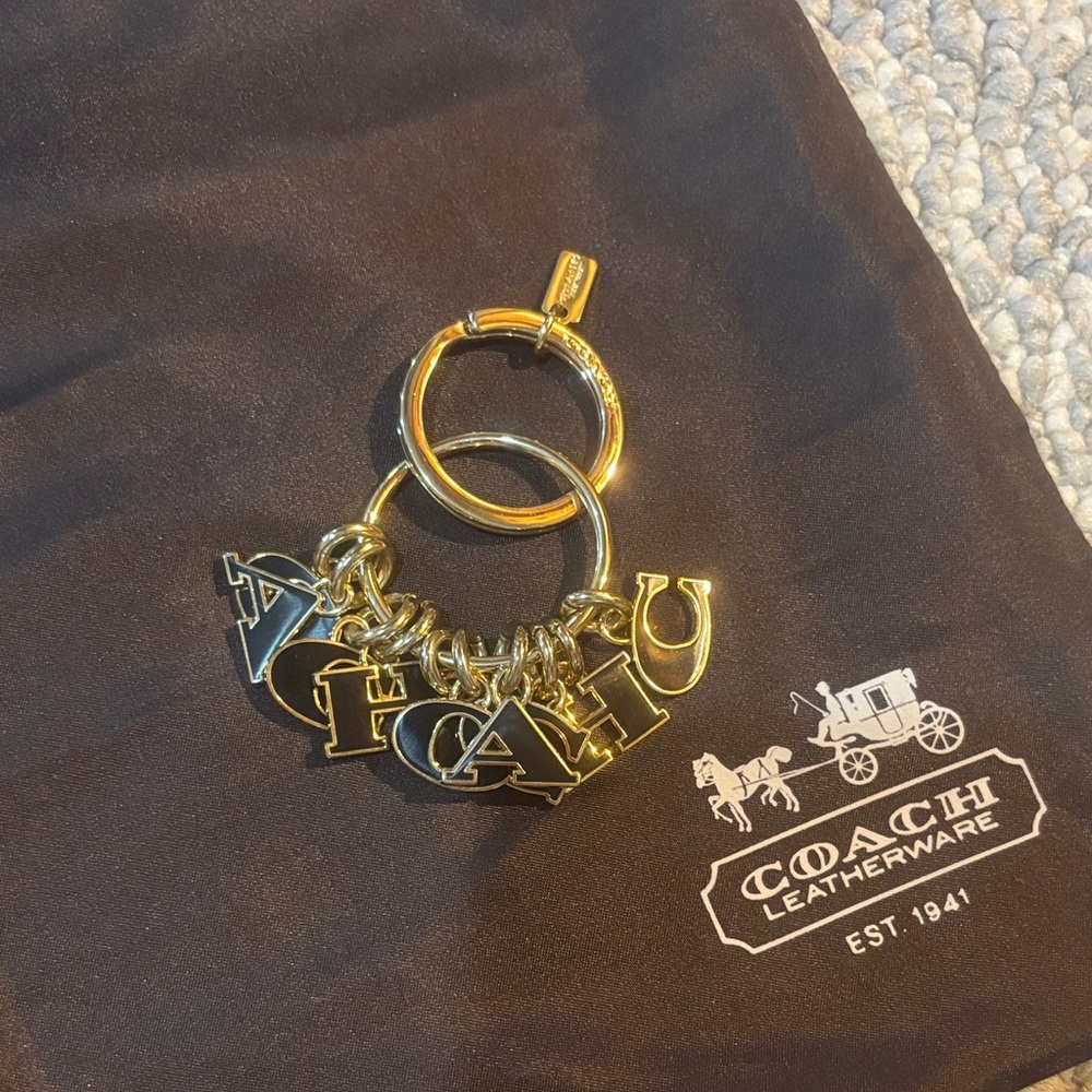 Coach Gold Letter Charm Keyring with Black Enamel Accents